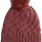 Coal Ladies Maizy Tall Pom Beanie 2023 - A dusty rose-colored beanie with a tall, fluffy pom-pom on top.