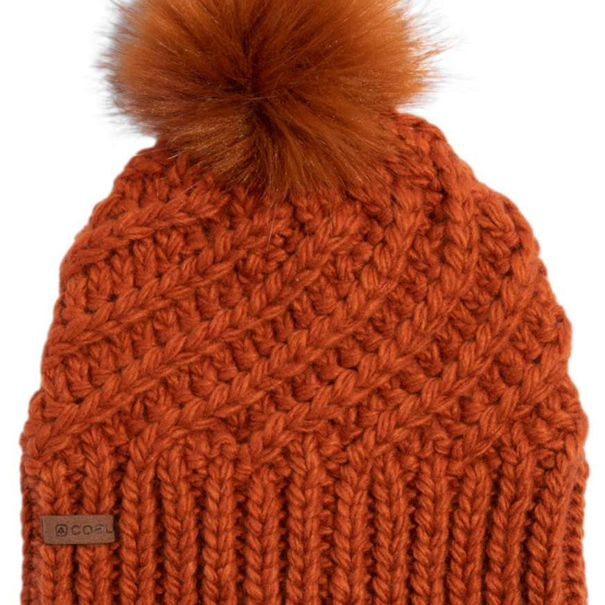 Coal Maizy Tall Pom Beanie - A rust-colored beanie with a tall, fluffy pom-pom on top.