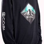 Coal Tracker Long Sleeve Shirt 2023 - A black long-sleeved shirt with a white logo on the chest and a small tag on the left sleeve.