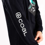 Coal Tracker Long Sleeve Shirt 2023 - A black long-sleeved shirt with a white logo on the chest and "COAL" written in small letters along the bottom hem.