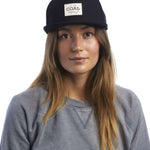 Coal Uniform Cap 2023 - Black hat with white rectangular patch on front featuring "COAL" in black letters and smaller text below that says "NECESSITIES FOR FINE LIVING".