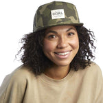 Coal Uniform Cap 2023 - A camouflage cap with a white rectangular patch on the front featuring the word "COAL" in black letters.