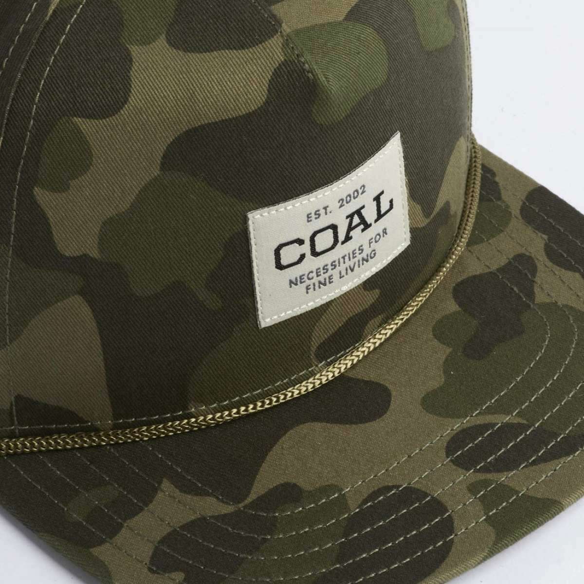 Coal Uniform Cap 2023 - A camouflage cap with a white rectangular patch on the front featuring the word "COAL" in black letters.