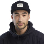 Coal Uniform Cap 2023 - Black cap with white rectangular patch on front featuring "COAL" in black letters.