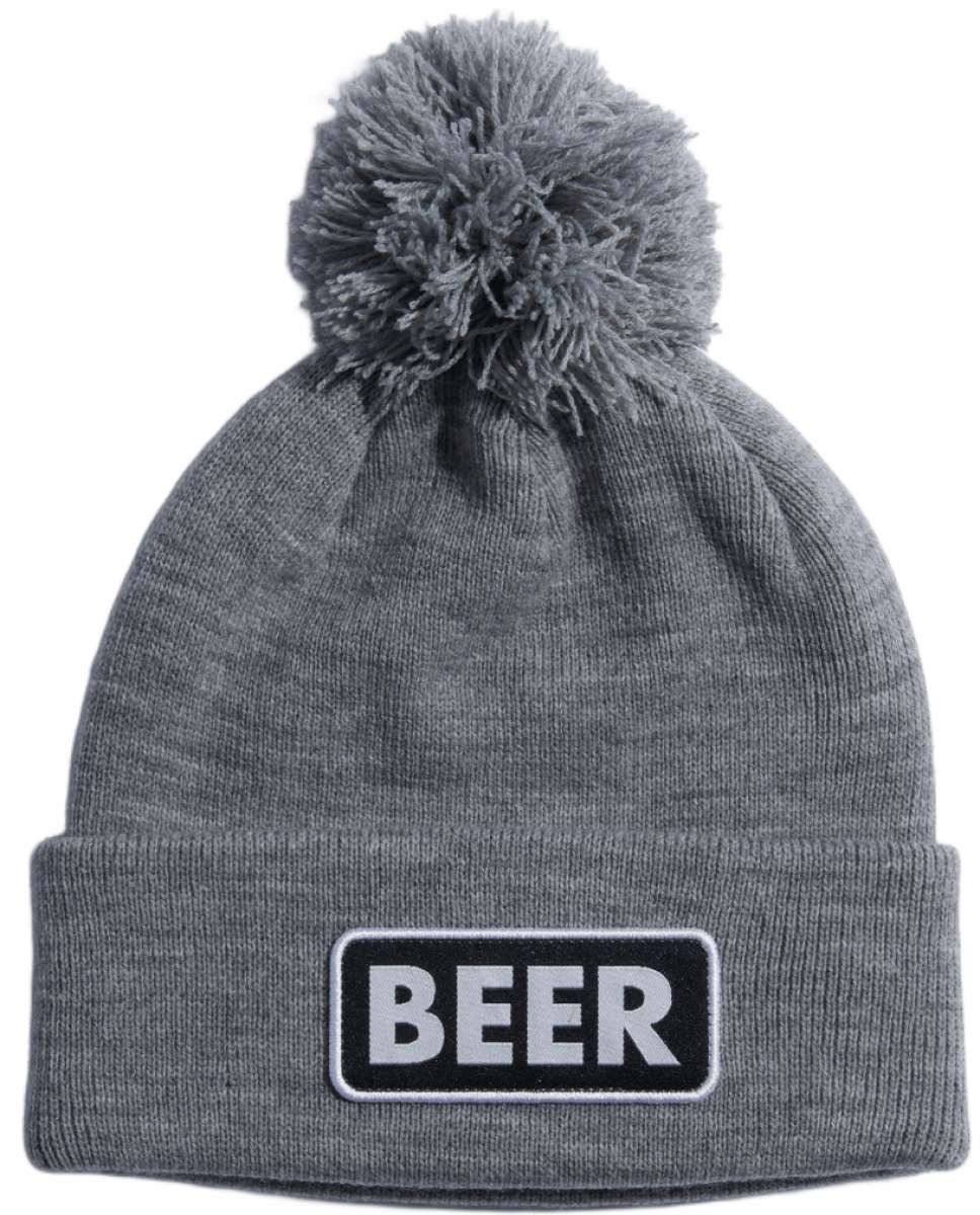 Coal Vice Mid Length Pom Beanie 2023 - A gray beanie with a large, fluffy pom-pom on top and a black patch that says "BEER" in white letters.