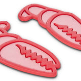Crab Grab Mega Claw Stomp Pad 2024 - A pink pad with a claw-shaped grip pattern and a rounded edge, featuring a small circular logo on the top left corner.