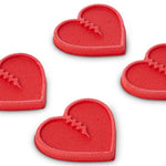 Crab Grab Mini Hearts Stomp Pad 2024 - Red heart-shaped pad with a textured surface and a small, raised logo in the center.