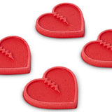 Crab Grab Mini Hearts Stomp Pad 2024 - Red heart-shaped pad with a textured surface and a small, raised logo in the center.