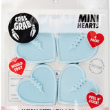Crab Grab Mini Hearts Stomp Pad 4 Pack 2022-2023 - Four light blue heart-shaped pads with a textured surface and small spikes on top.