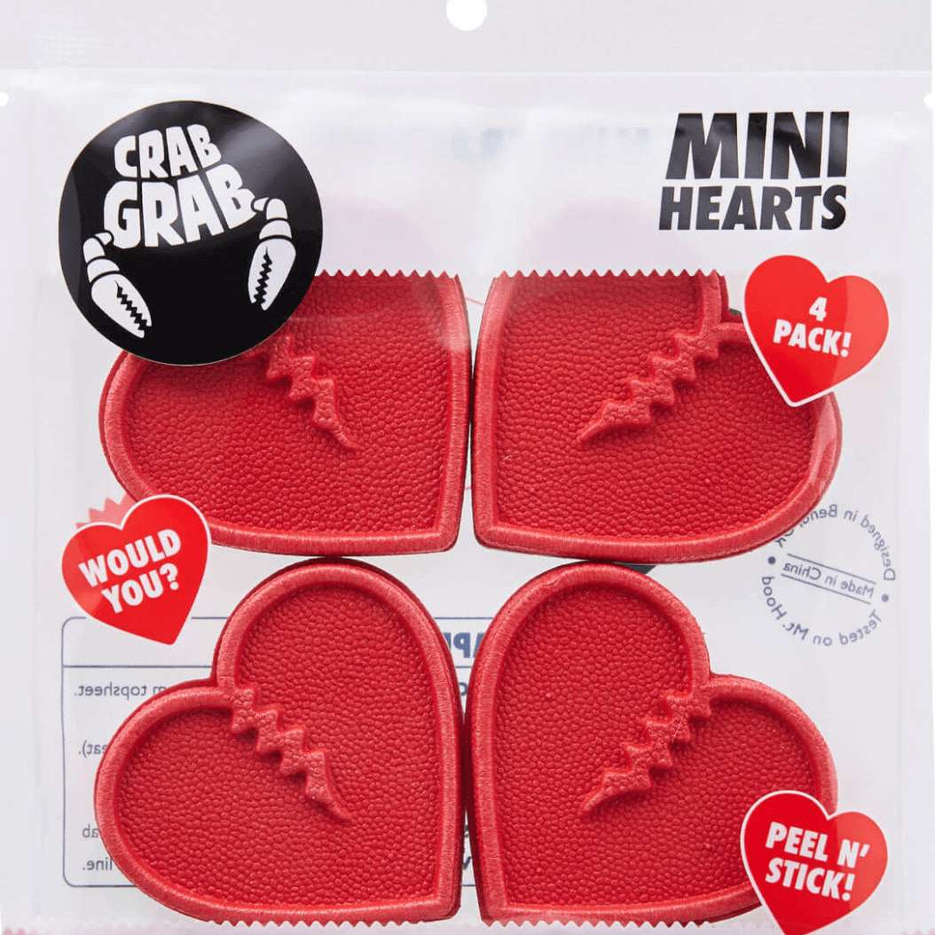 Crab Grab Mini Hearts Stomp Pad 4 Pack 2022-2023 - Four red heart-shaped stomp pads with a textured surface and serrated edges, arranged in two rows of two.