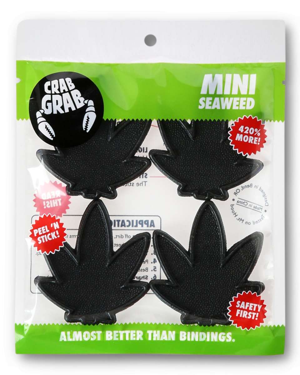 Crab Grab Mini Seaweed Stomp Pad 2024 - Black seaweed-shaped pad with white lettering on a black background.