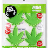 Crab Grab Mini Seaweed Stomp Pad 2024 - Green seaweed-shaped pad with a textured surface and a small, circular logo on top.