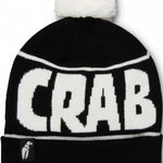 Crab Grab Pom Beanie 2022-2023 - A black beanie with a white pom-pom on top and "CRAB GRAB" embroidered in white across the front.