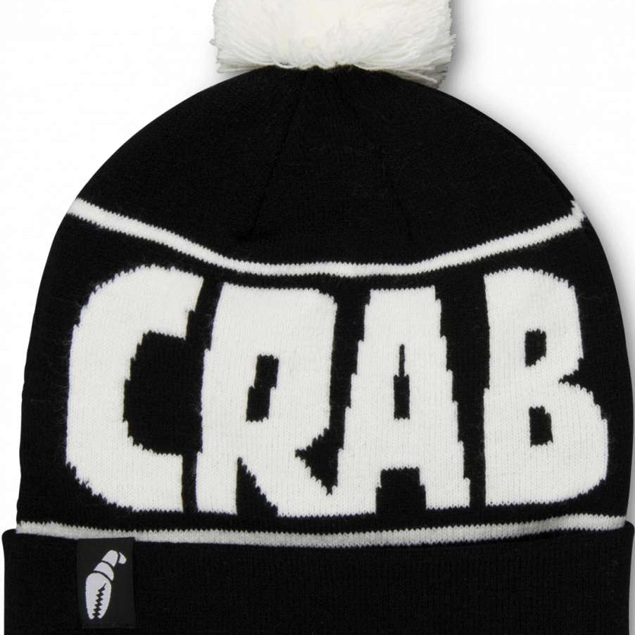 Crab Grab Pom Beanie 2022-2023 - A black beanie with a white pom-pom on top and "CRAB GRAB" embroidered in white across the front.