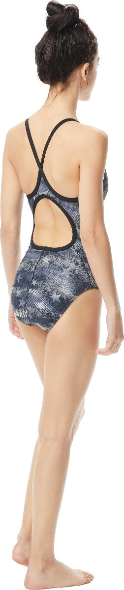 TYR Ladies' American Dream Diamondfit Swimsuit - A black and white swimsuit with a diamond pattern, featuring thin straps and cutouts on the sides.