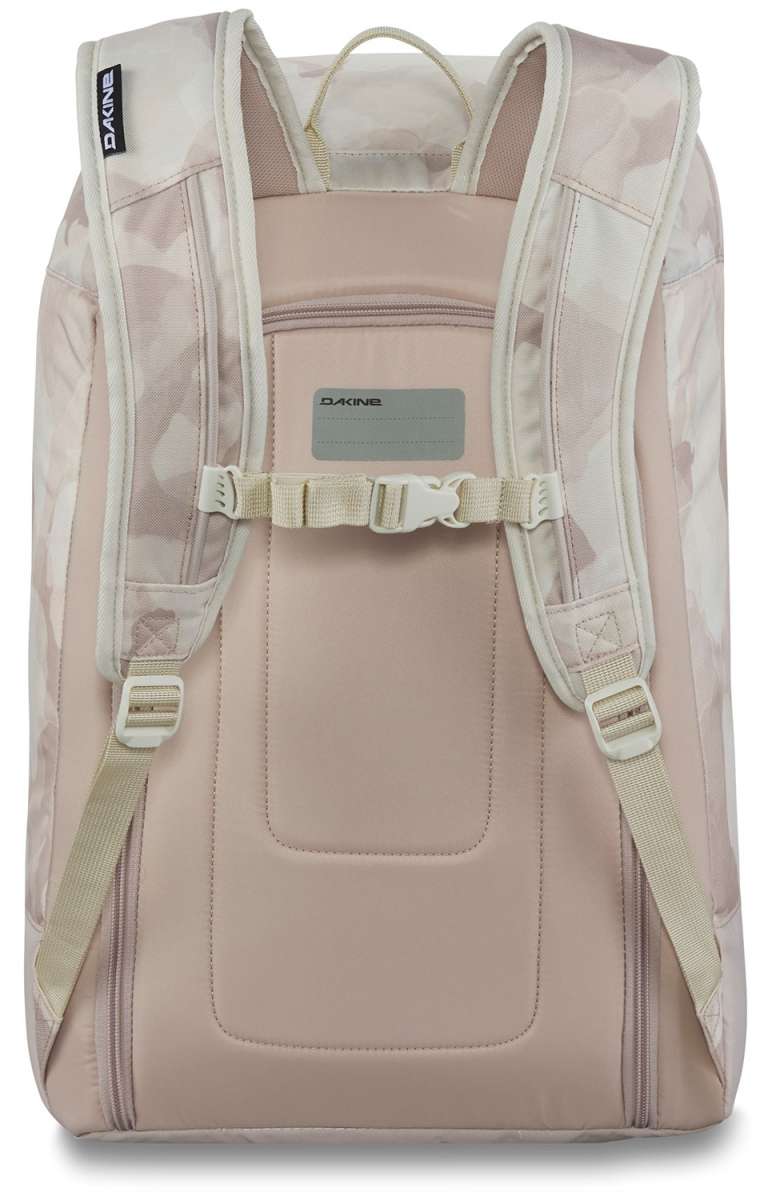 Dakine Boot Pack 50L 2024 - A large, tan-colored backpack with a zippered front pocket and two adjustable shoulder straps.