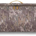 Dakine Boundary Ski Roller Bag 2024 - A brown ski roller bag with a zippered top and two side pockets, featuring a handle on one end.