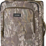 Dakine Carry-On Roller 42L Bag - A large, rectangular bag with a handle and wheels at the bottom, featuring a camouflage pattern in shades of brown and green.