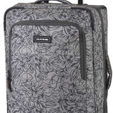 Dakine Carry-On Roller 42L Bag - A gray roller bag with a floral pattern and black trim, featuring a handle on top and two wheels at the bottom.