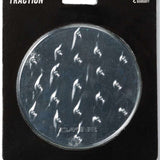 Dakine Circle Mat Stomp Pad 2022-2023 - A round, clear stomp pad with a textured surface and a circular logo in the center.