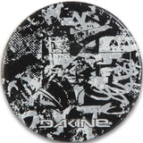 Dakine Circle Mat Stomp Pad 2022-2023 - A black and gray stomp pad with a geometric pattern of lines and shapes, featuring the word "DAKINE" in white letters at the bottom.