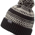 Dakine Davina Beanie 2022-2023 - A black beanie with a white geometric pattern and a large pom-pom on top.
