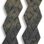 Dakine DK Gromps Stomp Pads 2022-2023 - A pair of black stomp pads with a grippy texture and a rectangular shape, featuring a small logo on the top.