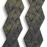 Dakine DK Gromps Stomp Pads 2022-2023 - A pair of black stomp pads with a grippy texture and a rectangular shape, featuring a small logo on the top.