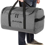 Dakine EQ Duffle 70L Bag 2024 - A large grey duffel bag with black straps and zippers.