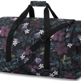 Dakine EQ Duffle 70L Bag 2024 - A large duffel bag with a black base color and a pattern of green, purple, and white flowers and leaves printed all over it.