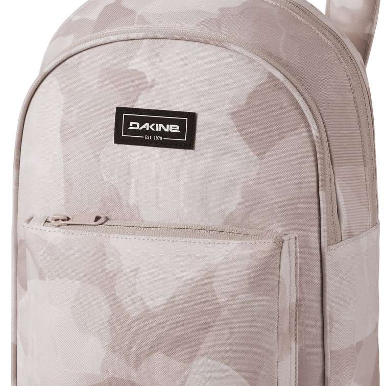 Dakine Ladies Essentials Pack 7L 2022-2023 - A light gray backpack with a zippered front pocket and two straps.
