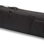 Dakine Fall Line Ski Roller Bag - A black roller bag with a zippered top and two handles, featuring the brand name "DAKINE" in white letters on one side.