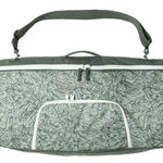 Dakine Freestyle Board Bag 2024 - A light blue bag with a floral pattern and white trim, featuring the word "DAKINE" in white letters on the front.