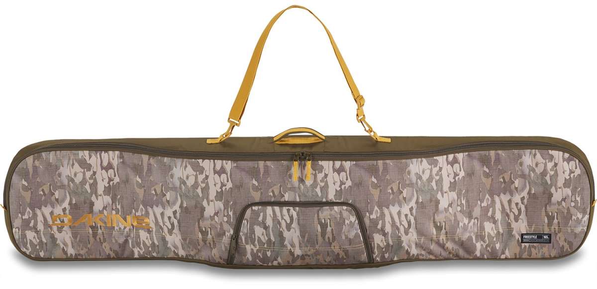 Dakine Freestyle Board Bag 2024 - A brown, rectangular bag with a zippered top and two yellow shoulder straps.