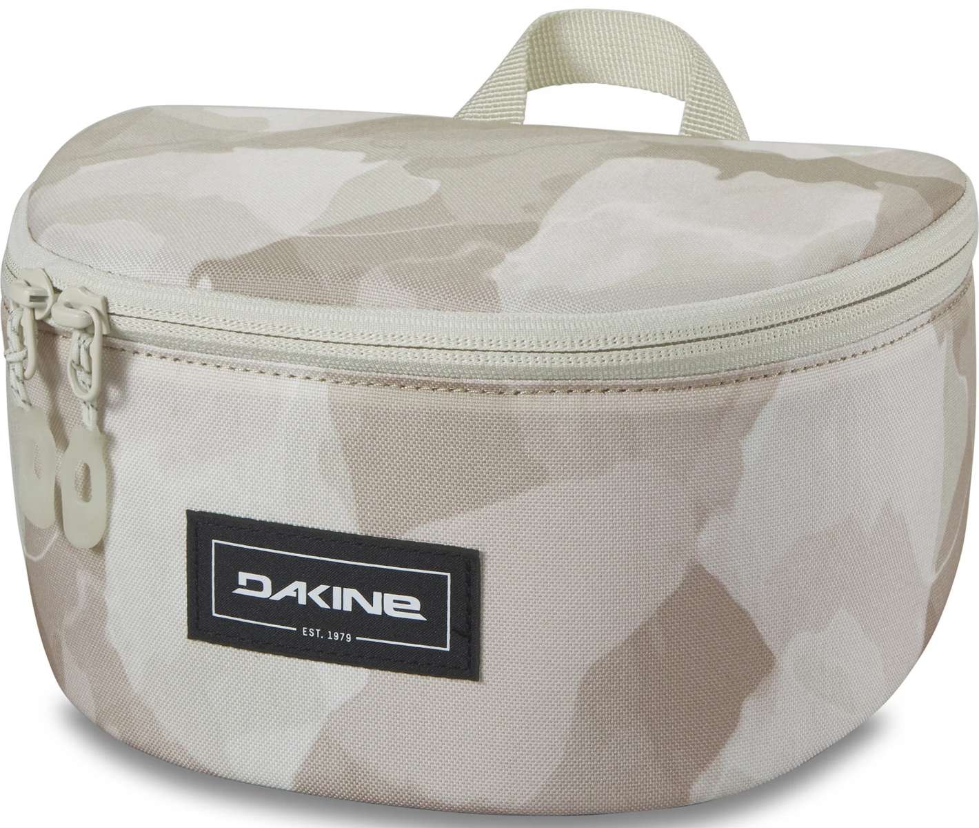 Dakine Goggle Stash - A tan-colored bag with a zippered top and handle, featuring a geometric pattern on its front.