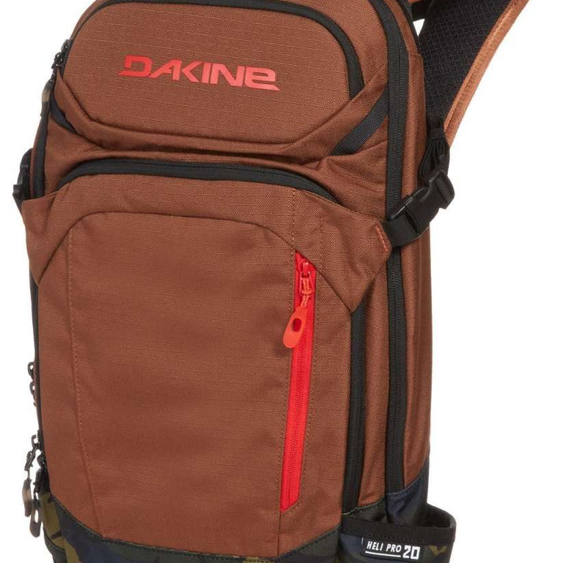 Dakine Heli Pro 20L Backpack 2024 - A brown backpack with black trim and a red zipper on the front pocket.