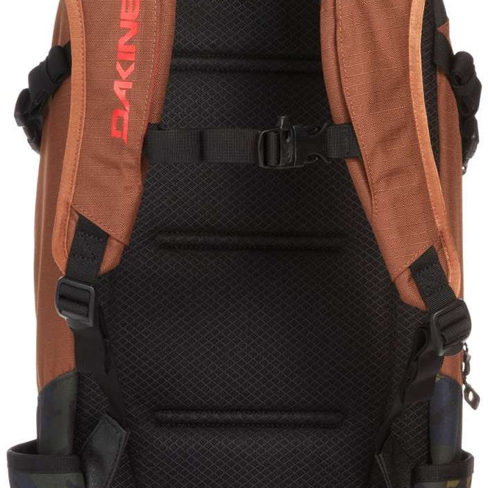 Dakine Heli Pro 20L Backpack 2024 - A brown backpack with a black mesh back panel and straps, featuring a zippered pocket on the front.