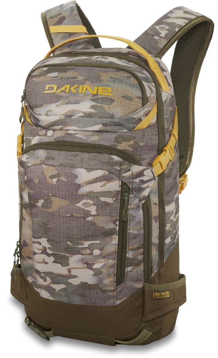 Dakine Heli Pro 20L Backpack - A camouflage backpack with yellow accents and a zippered front pocket.