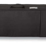 Dakine High Roller Board Bag - Black bag with a zippered top and two side pockets, featuring a handle on top and wheels at the bottom.