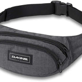 Dakine Hip Pack - A gray hip pack with a black zipper and white lettering on the front.