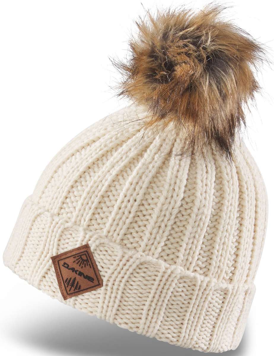 Dakine Kids Kylie Beanie 2022-2023 - A cream-colored beanie with a brown faux fur pom-pom on top.