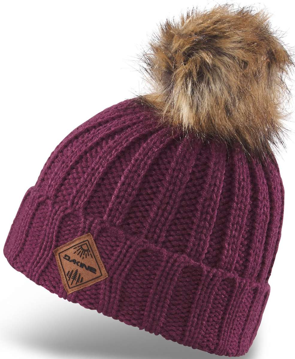 Dakine Kids Kylie Beanie 2022-2023 - A maroon beanie with a brown faux fur pom-pom on top.