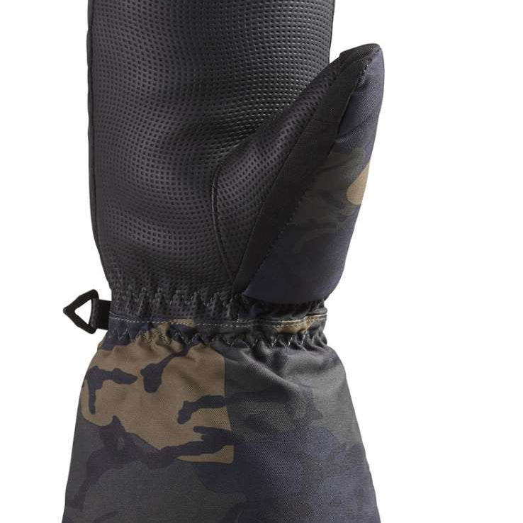 Dakine Kids Yukon Mitt 2022-2023 - A black and gray mitt with a camouflage pattern on the palm side, featuring a drawstring at the wrist.