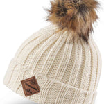 Dakine Youth Kylie Beanie - A cream-colored beanie with a brown faux fur pom-pom on top.