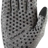 Dakine Lades Storm Liner 2022-2023 - A gray glove with black dots and a textured grip on the thumb.