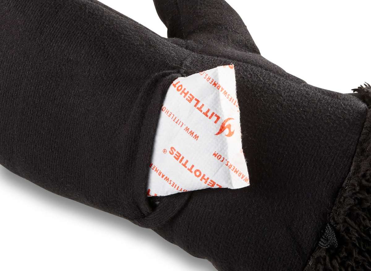 Dakine Ladies Alero Mittens - Mittens are black with a textured pattern on the palm and thumb, featuring a fuzzy cuff at the wrist.