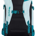 Dakine Ladies Heli Pro 20L Backpack 2024 - A white backpack with teal accents and straps, featuring a zippered front pocket and adjustable shoulder straps.