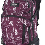 Dakine Ladies Heli Pro 20L Backpack 2024 - A purple backpack with white floral pattern and black trim, featuring a zippered front pocket and adjustable straps.