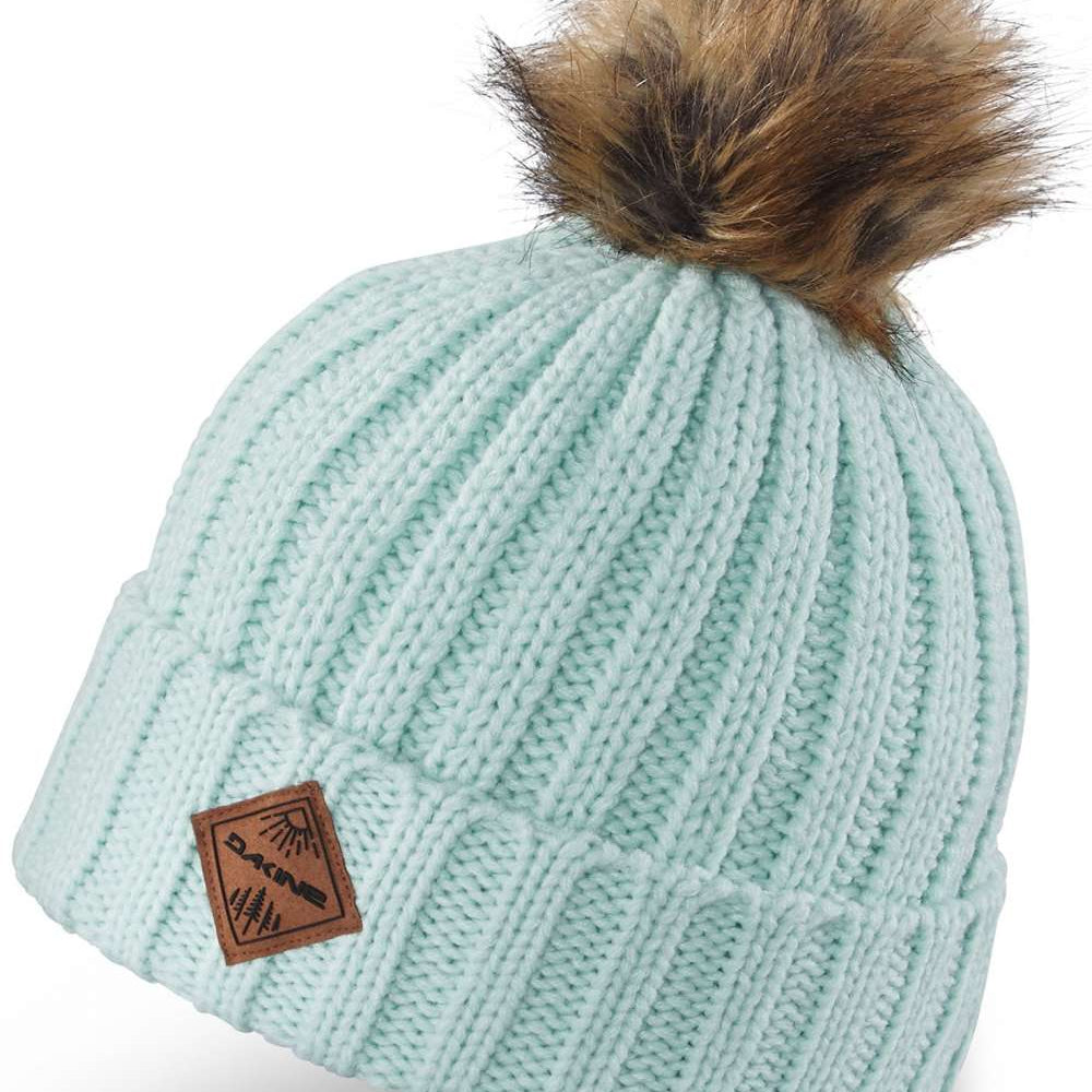 Dakine Ladies Kylie Beanie 2022-2023 - A light blue beanie with a brown faux fur pom-pom on top.