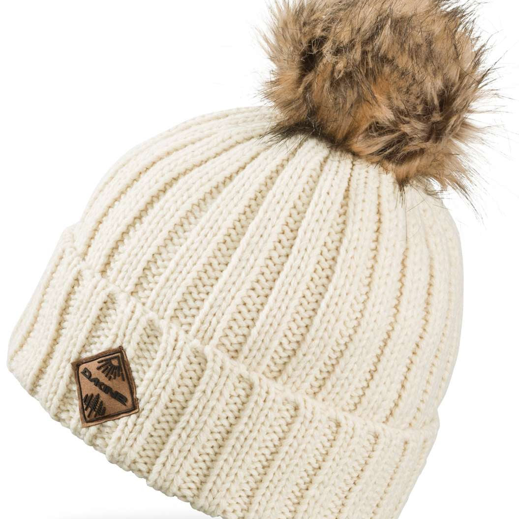 Dakine Ladies Kylie Beanie 2022-2023 - A cream-colored beanie with a brown faux fur pom-pom on top.
